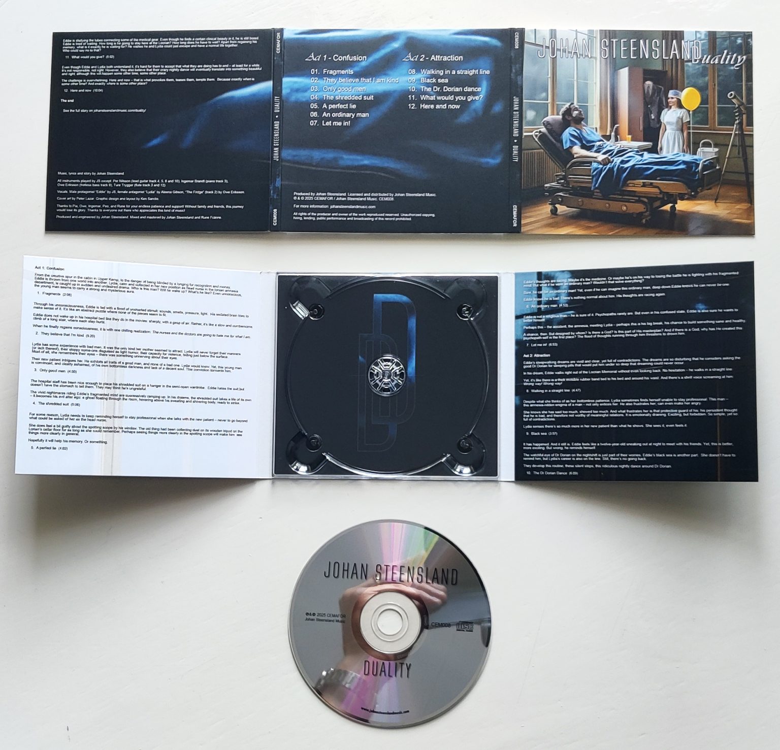 The Duality CD: the opened six-panel digipak with the tracklist and the story, and the disc.